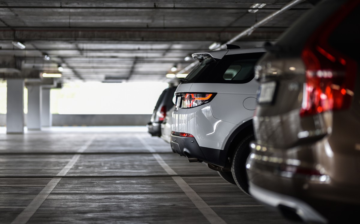 Cars parked in a covered parking garage 263791458