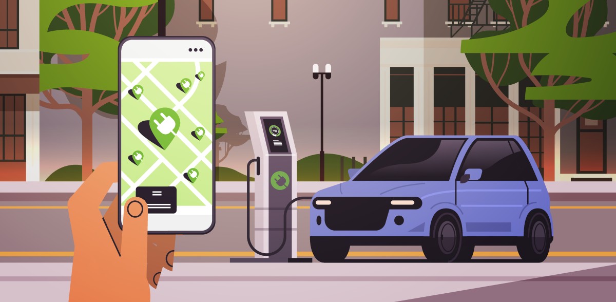 cartoon of hand holding phone with EV charging app while a car charges at an EV charging station in the background 535061669